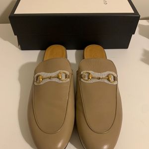 Authentic Gucci Princetown slides... Mud Color. Purchased at Saks fifth avenue.